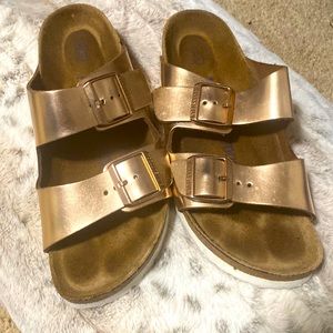 Birkenstock slides rose gold color